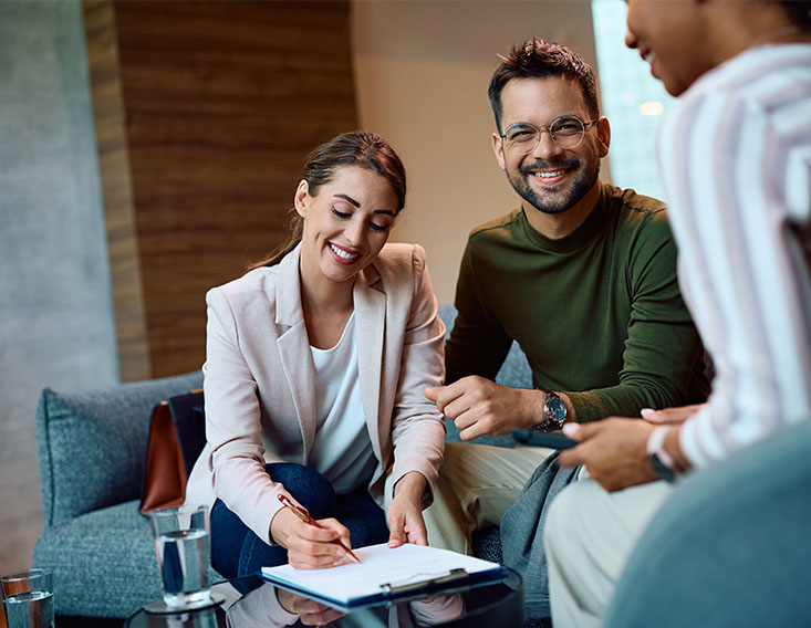 Couple applying for a personal loan at First State Bank