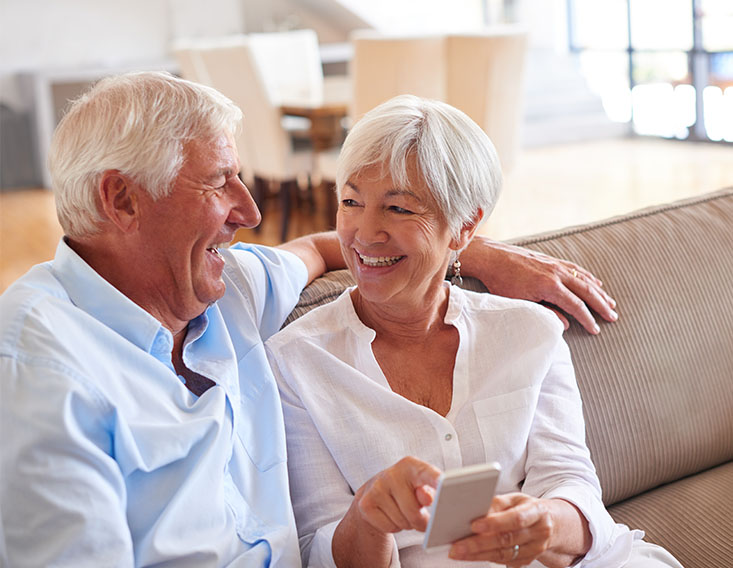Mature couple learning more about First State Bank's Dementia & Aging-Friendly Banking program