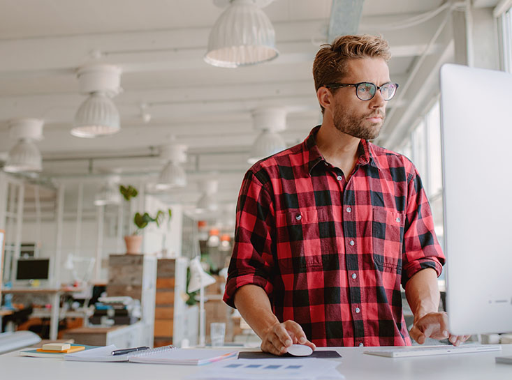 Business owner enjoying his First State Bank checking account