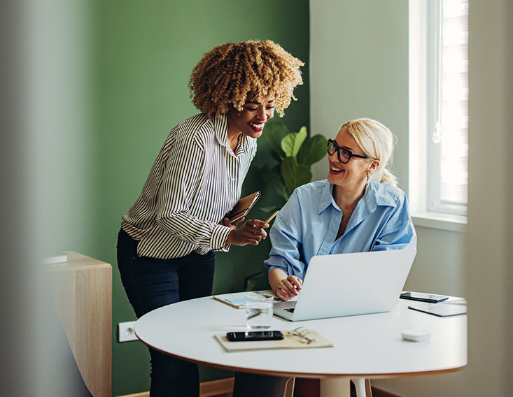 Business owners enjoying their Business Now Checking account from Frist State Bank