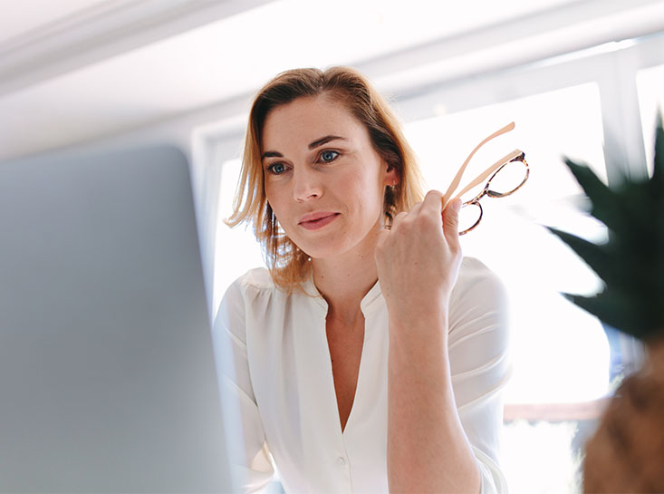 Business owner reviewing the savings options at Frist State Bank