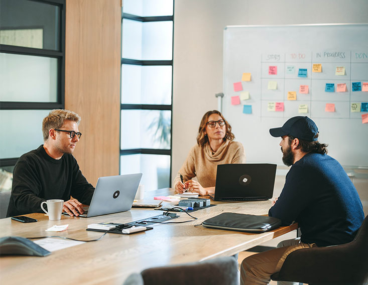 Business owners enjoying their corporate savings account from First State Bank