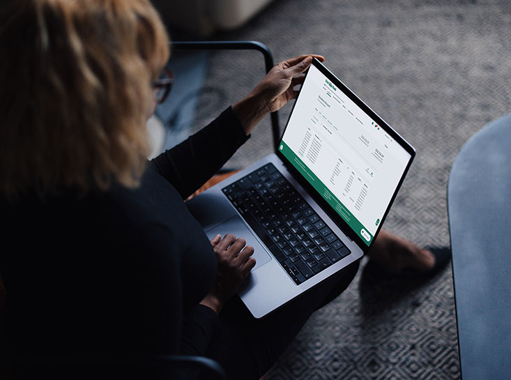Business customer managing their account using digital banking at First State Bank