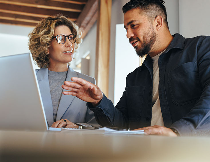 Business customers evaluating expenses with cash management from First State Bank