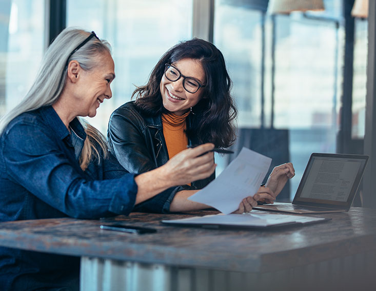 Business customers reviewing remote deposit check deposits