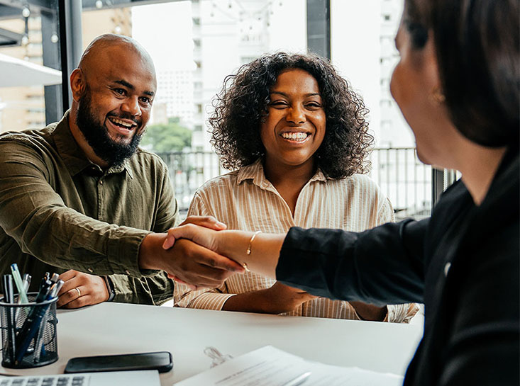 First State Bank mortgage customers closing their home loan