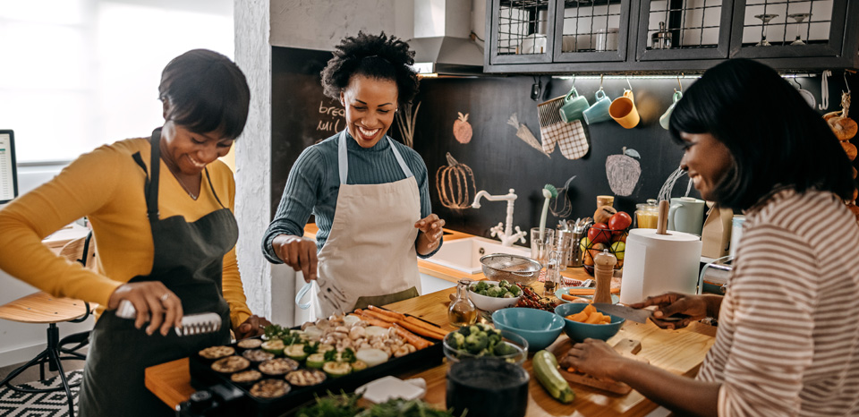 Family cooking in renovated kitchen.